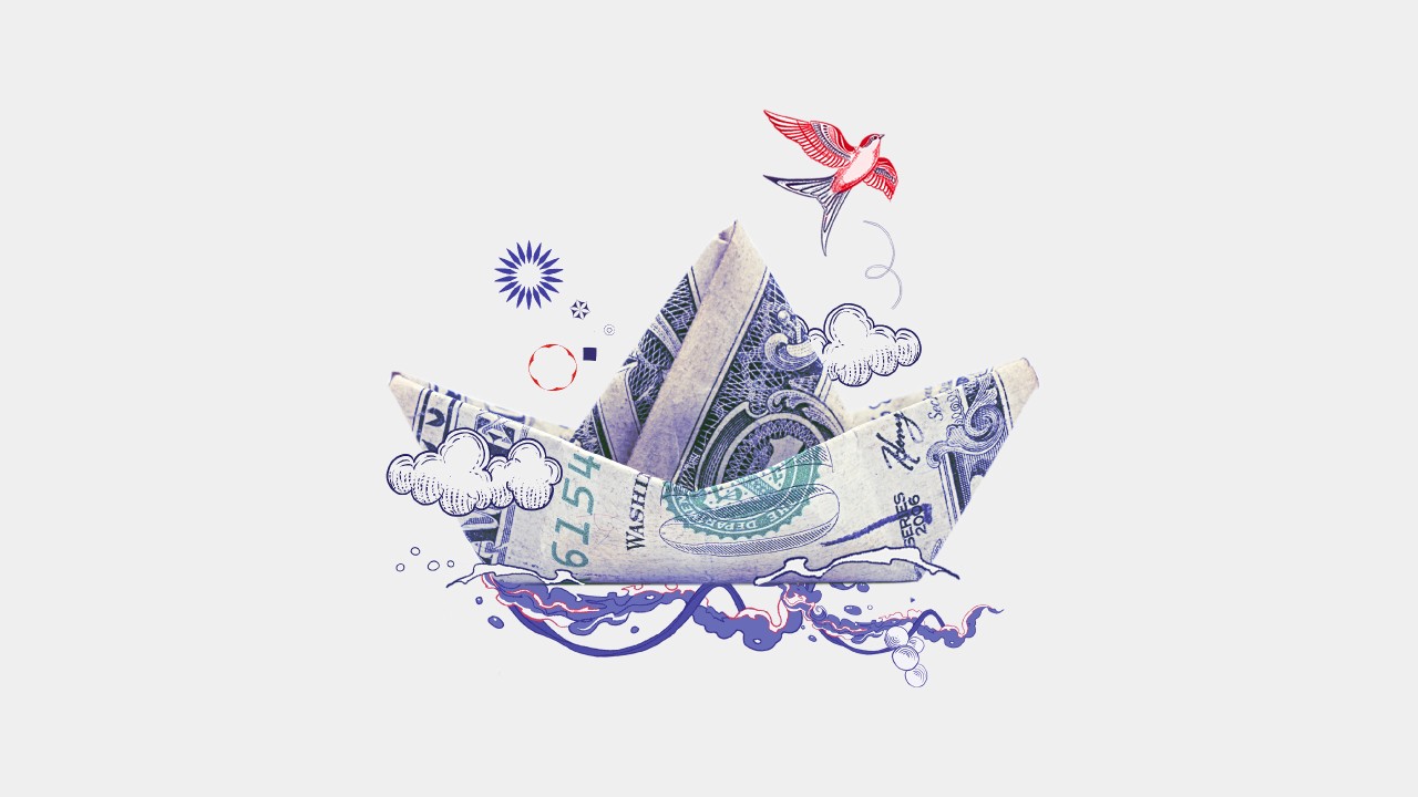 A ship folded from banknote, with illustrations of waves, a cloud and a bird.