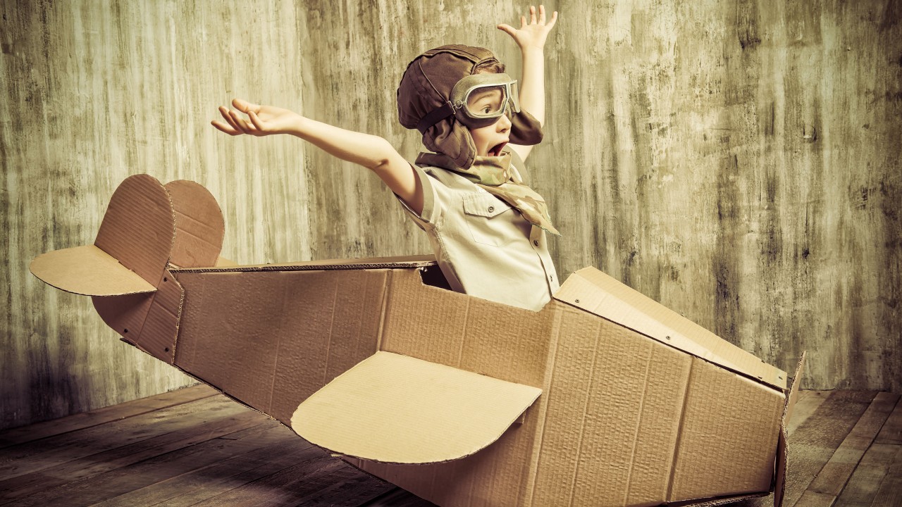 A boy role playing as pilot; image used for HSBC Taiwan Co-Brand Card conversion page.